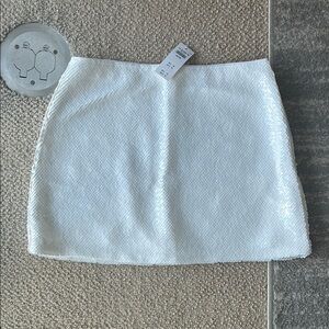 White sequin mini skirt